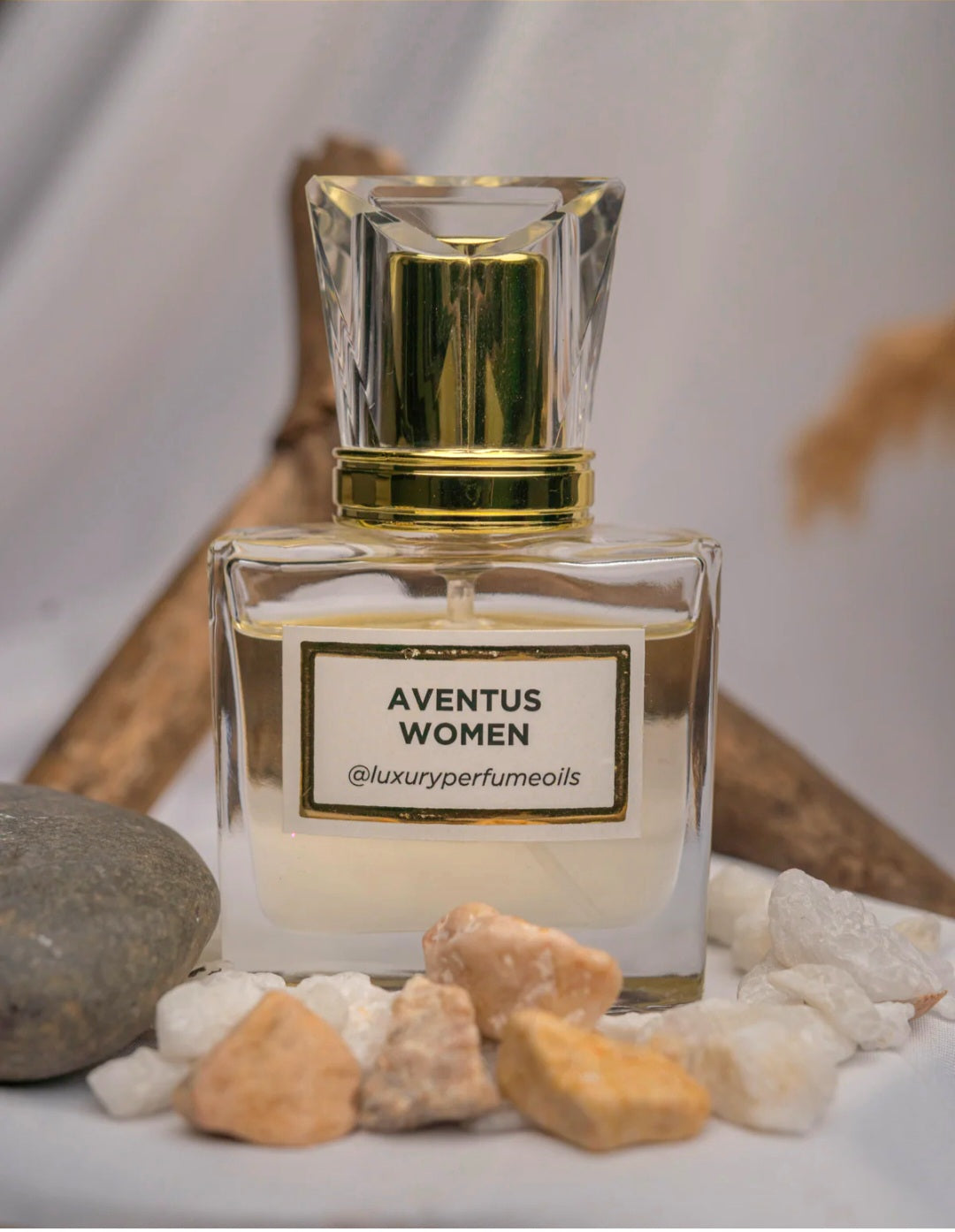 Our Version of Aventus Woman Creed 20ml alcohol-free perfume oil bottle with chypre fruity fragrance featuring green apple, bergamot, rose, peach, amber, and ylang-ylang.