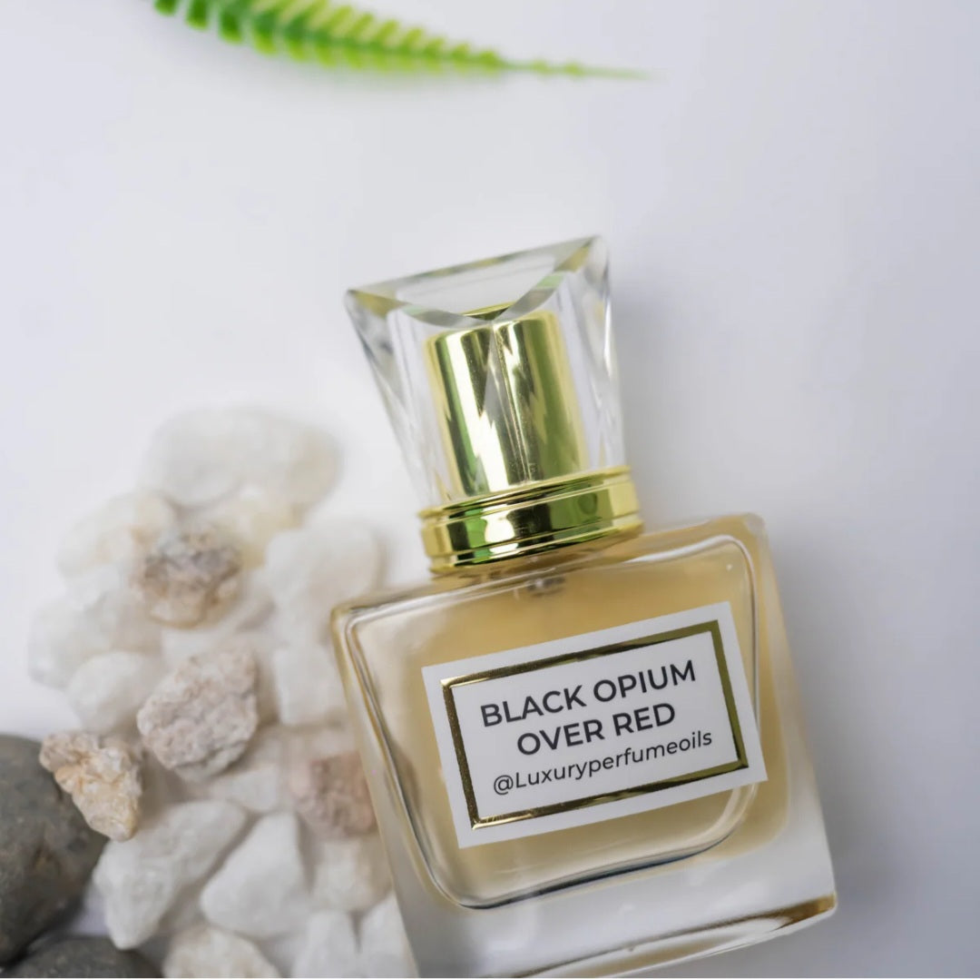 Our Version of Black Opium Over Red 20ml alcohol-free perfume oil bottle with floral fruity gourmand fragrance featuring cherry, green mandarin, jasmine, vanilla, coffee, and patchouli.