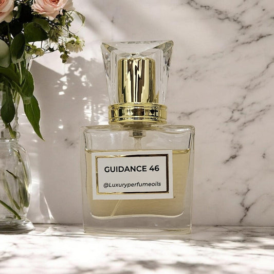 Our Version of Guidance 46 20ml alcohol-free perfume oil bottle with floral fruity fragrance featuring pear, jasmine sambac, rose, vanilla, sandalwood, and ambergris.