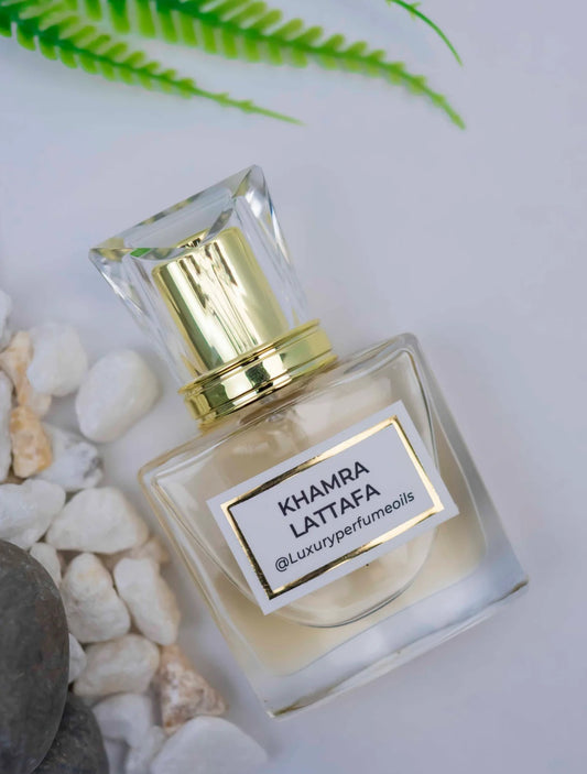 Our Version of Khamra Lattafa 20ml alcohol-free perfume oil bottle with oriental spicy fragrance featuring cinnamon, dates, praline, vanilla, tonka bean, and amberwood.