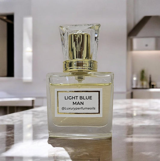 Our Version of Light Blue Man 20ml alcohol-free perfume oil bottle with fresh woody aromatic fragrance featuring lemon, rosemary, and patchouli.