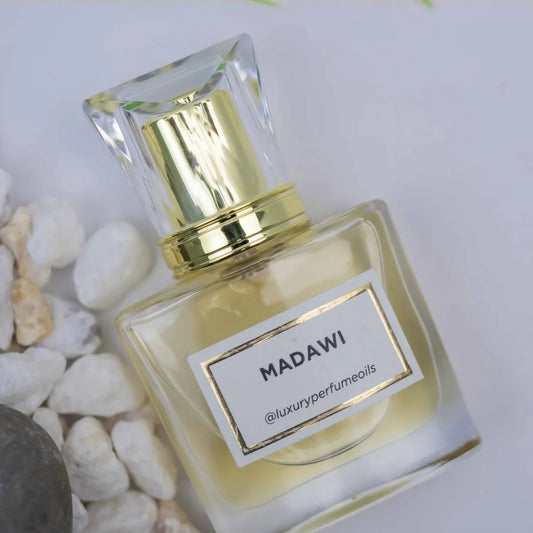 Our Version of Madawi 20ml alcohol-free perfume oil bottle with oud fragrance featuring peach, apple blossom, pineapple blossom, wild rose, musk, and patchouli.