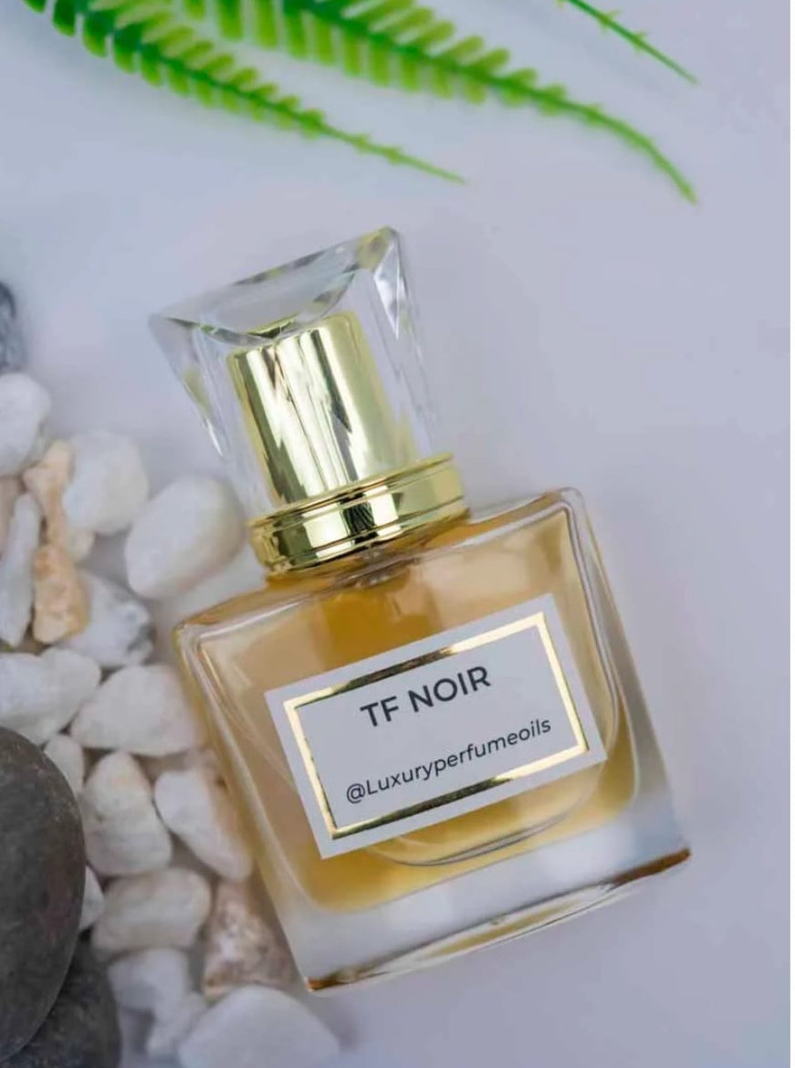 Our Version of Tom Ford Noir 20ml alcohol-free perfume oil bottle with oriental woody fragrance featuring violet, bergamot, iris, leather, vanilla, amber, and patchouli.